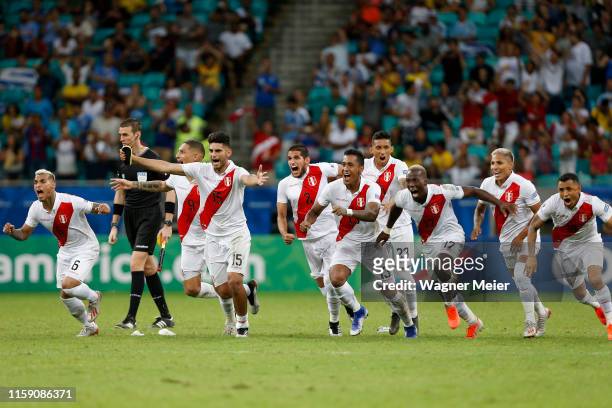 Players of Peru celebrate after winning during a penalty shootout after the Copa America Brazil 2019 quarterfinal match between Uruguay and Peru at...