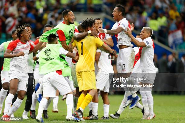 Edison Flores of Peru celebrates with teammates after scoring the winning penalty during a penalty shootout after the Copa America Brazil 2019...