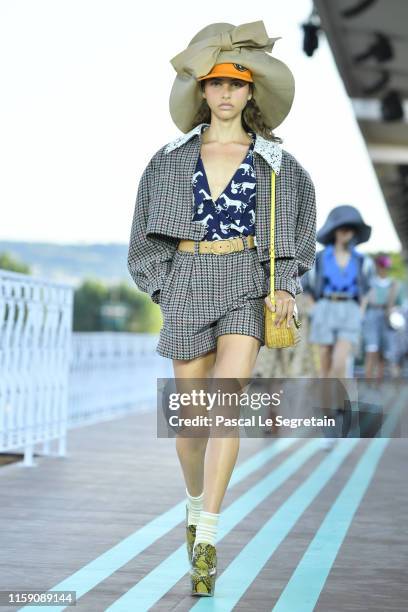 Model walks during the runway miu miu club show at Hippodrome d'Auteuil on June 29, 2019 in Paris, France.