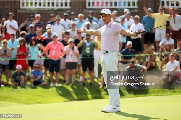 Cameron Champ reacts after making birdie on the 18th green during round three of the Rocket Mortgage Classic at the Detroit Country Club on June 29,...