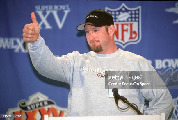 Trent Dilfer of the Baltimore Ravens talks to the media prior to Super Bowl XXXV circa 2001 at Raymond James Stadium in Tampa, Florida. The Ravens...