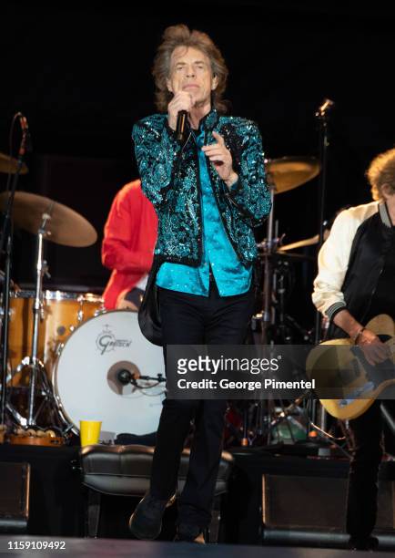 Mick Jagger performs onstage as The Rolling Stones perform for the North American run of their 'NO FILTER' Tour at Burl's Creek Event Grounds on June...