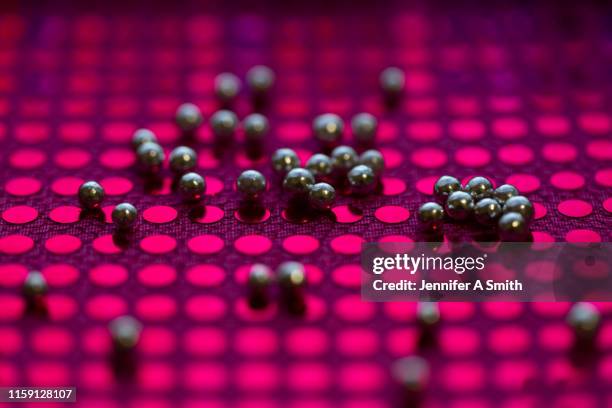 silver cachous - ball bearing stock pictures, royalty-free photos & images