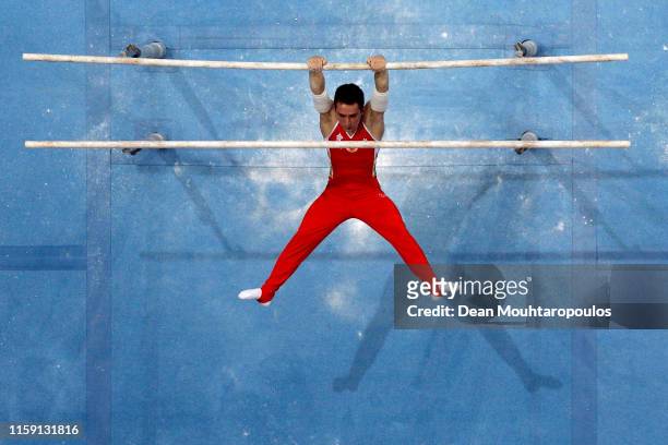 David Belyavskiy of Russia competes on the Parallel bars during the Artistic Gymnastics Men’s All-Around Finals event during Day nine of the 2nd...