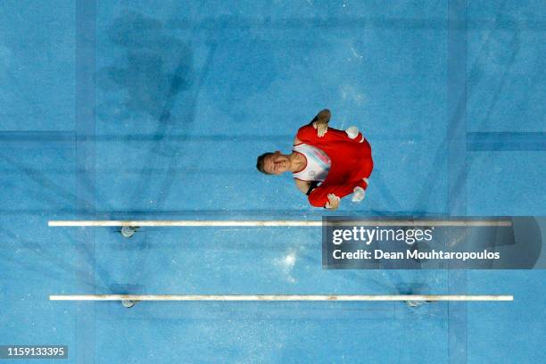 Ivan Tikhonov of Azerbaijan competes on the Parallel bars during the Artistic Gymnastics Men’s All-Around Finals event during Day nine of the 2nd...