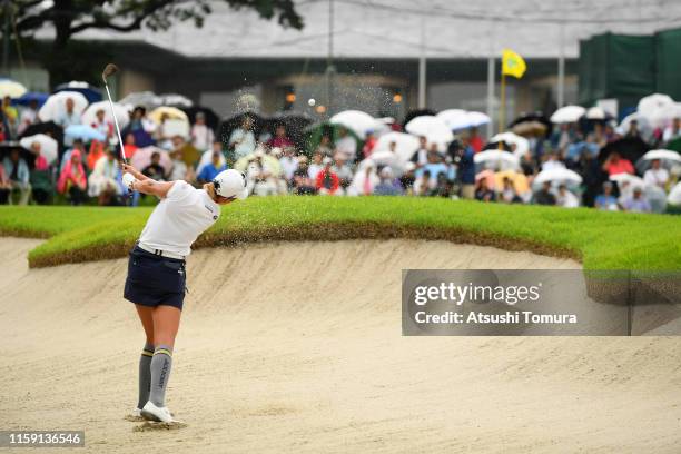 Erika Hara of Japan hits out from a bunker on the 16th hole during the final round of the Earth Mondamin Cup at the Camellia Hills Country Club on...