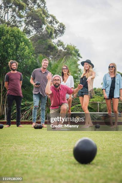 friends playing lawn bowling sydney australia - lawn bowls stock pictures, royalty-free photos & images