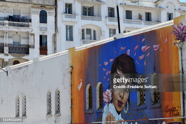 Mural painting describing the harassment in the college and Art deco building in ancient french quarter in Casablanca on June 21, 2019 in Casablanca,...
