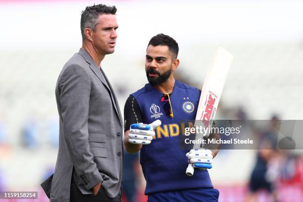 India captain Virat Kohli in conversation with ex England cricketer Kevin Pietersen ahead of the Group Stage match of the ICC Cricket World Cup 2019...