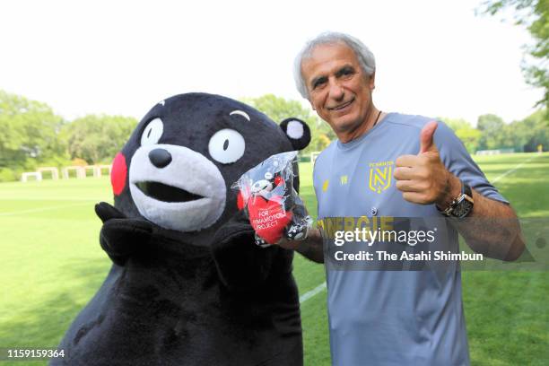 Nante head coach Vahid Halilhodzic interacts Kumamoto Prefecture mascot Kumamon at the Nante FC training ground on June 28, 2019 in Nantes, France.