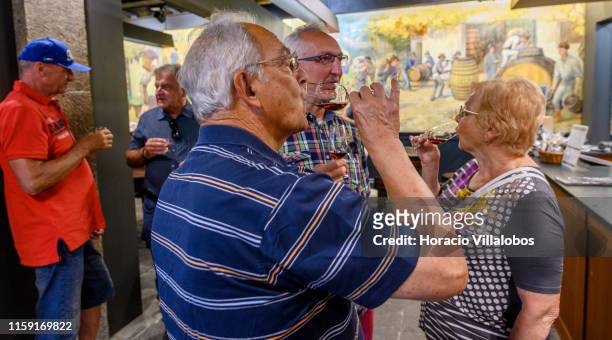Tourists taste Madeira wine at Blandy's Wine Lodge on June 27, 2019 in Funchal, Portugal. The Blandy family is the only family of all the original...