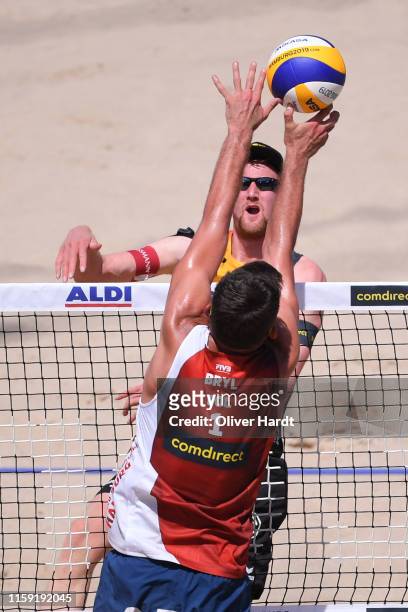 Yannick Harms of Germany spike the ball during the match againsts Michal Bryl of Poland during day three between the match Michal Bryl and Grzegorz...