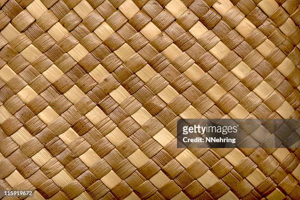 woven palm leaves in tan and brown - palm leaves pattern stock pictures, royalty-free photos & images