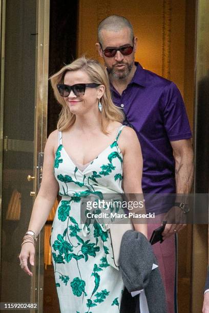Actress Reese Witherspoon and Jim Toth are seen on June 30, 2019 in Paris, France.