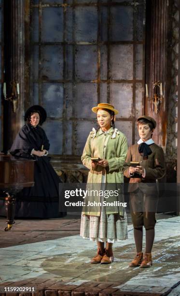 Leo Jamison as Miles, Adianna Forbes-Dorant as Flora and Sophie Bevan as The Governess perform on stage during the dress rehearsal of Benjamin...