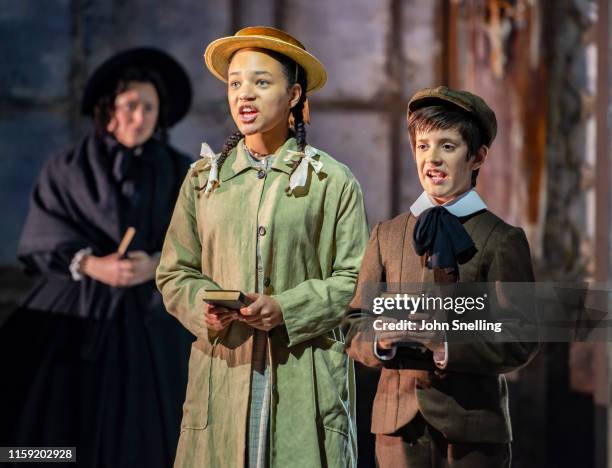 Leo Jamison as Miles, Adianna Forbes-Dorant as Flora and Sophie Bevan as The Governess perform on stage during the dress rehearsal of Benjamin...