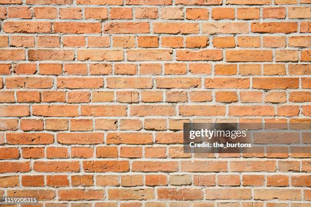 full frame shot of brick wall - brick stone wall stock pictures, royalty-free photos & images