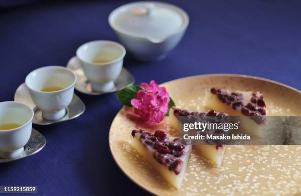traditional japanese summer sweets(wagashi ) - minazuki - japanese sweet stock-fotos und bilder