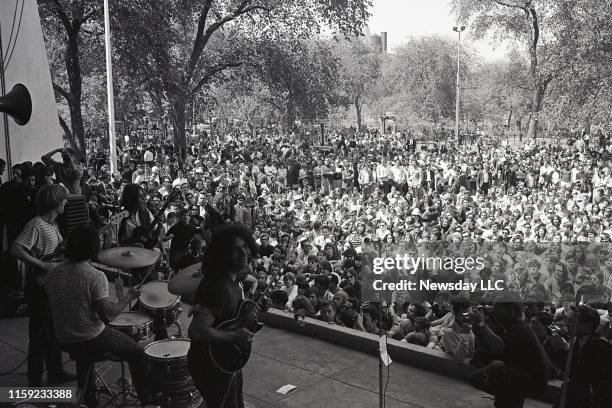 Jerry Garcia and the rest of the band play onstage at the first East Coast Grateful Dead show at Tompkins Square Park in the East Village on June 1,...