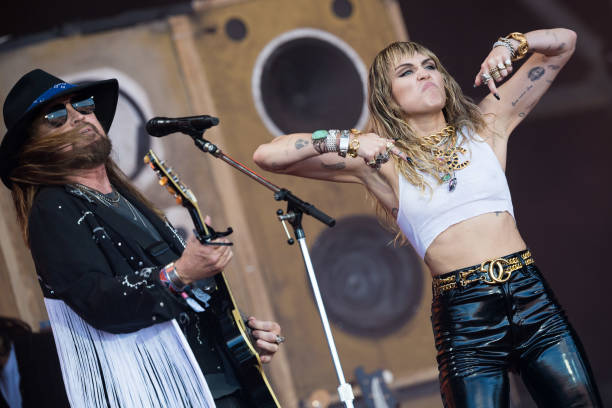 Billy Ray Cyrus and Miley Cyrus perform on the Pyramid stage on day five of Glastonbury Festival at Worthy Farm, Pilton on June 30, 2019 in...
