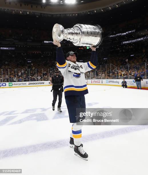 Oskar Sundqvist of the St. Louis Blues holds the Stanley Cup following the Blues victory over the Boston Bruins at TD Garden on June 12, 2019 in...