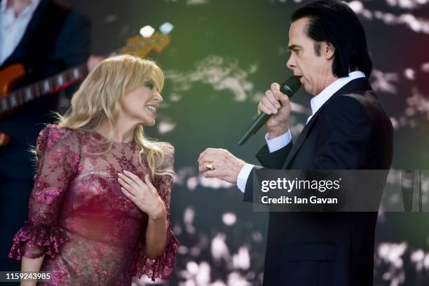 Kylie Minogue and Nick Cave perform on the Pyramid stage on day five of Glastonbury Festival at Worthy Farm, Pilton on June 30, 2019 in Glastonbury,...