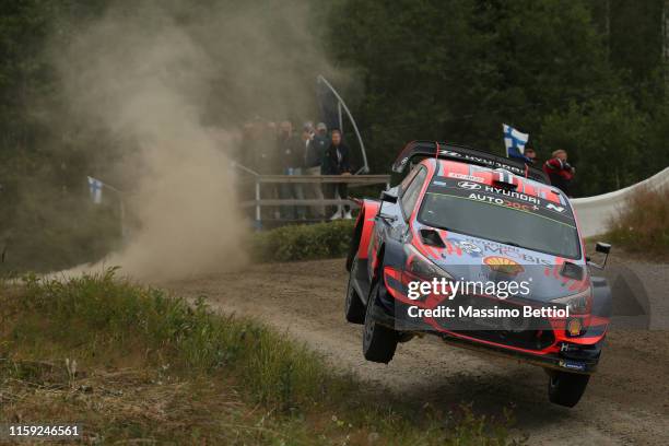 Andreas Mikkelsen of Norway and Anders Jaeger of Norway compete in their Hyundai Shell Mobis WRT Hyundai i20 Coupe WRC during Day One of the FIA WRC...