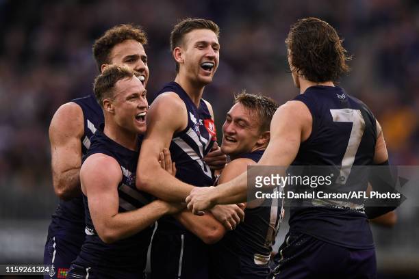 Taylin Duman of the Dockers celebrates after scoring a goal during the 2019 AFL round 20 match between the Fremantle Dockers and the Geelong Cats at...