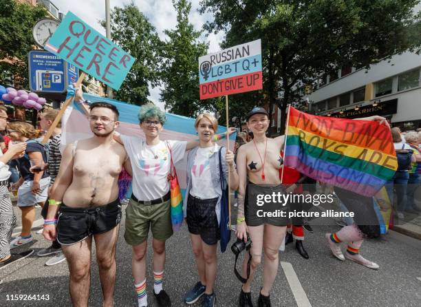 August 2019, Hamburg: LGBTQ activists from St.Petersburg, Russia, take part in the Christopher Street Day parade. The Pride Week takes place this...