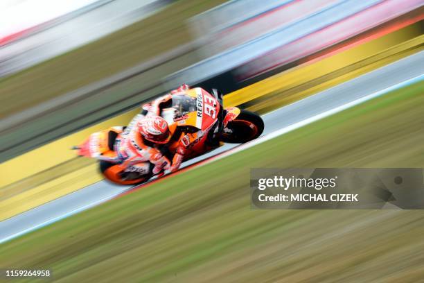 Repsol Honda Team's Spanish rider Marc Marquez rides his Honda during the fourth free practice session of the Moto GP Grand Prix of the Czech...