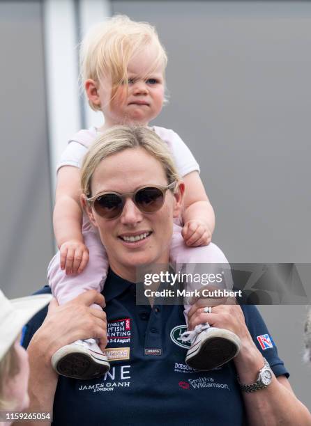 Zara Tindall and Lena Tindall watch the Pony Racing during the 2019 Festival of British Eventing at Gatcombe Park on August 3, 2019 in Stroud,...