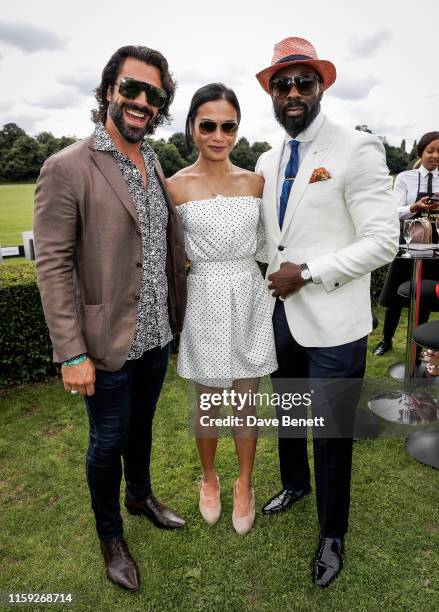 Christian Vit, Lourdes Faberes and Jay Udo-Udoma attend at the Lux Afrique Polo Day at the Ham Polo Club on August 3, 2019 in Richmond, England.