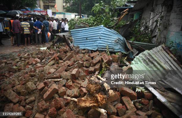 Compound wall collapse in which one person dead and other two injured at Manubhai Sheth CHS Chawl, Chandivali MHADA colony, on August 2, 2019 in...