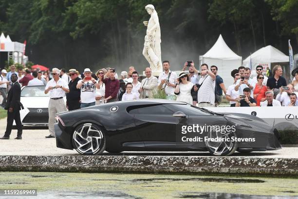 The French luxury brand Bugatti attends La Voiture Noire the most exclusive hyper sports cars during the parade of concept cars at the Chantilly Arts...