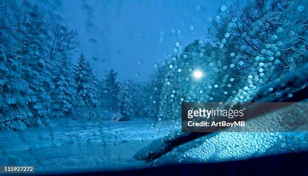 driving in a snowstorm - vindrutetorkare bildbanksfoton och bilder