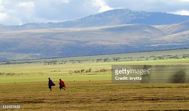 masai warriors going home - masai stock pictures, royalty-free photos & images