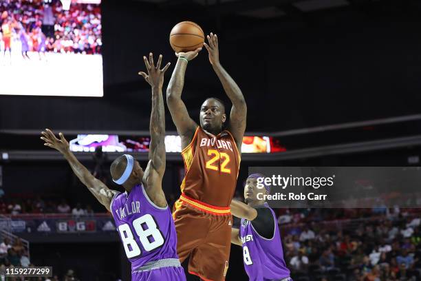 Anthony Morrow of the Bivouac shoots against Mike Taylor and Jamario Moon of the Ghost Ballers during week two of the BIG3 three on three basketball...