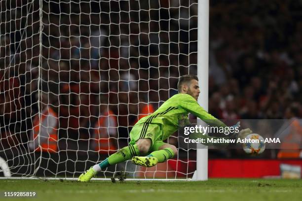 David de Gea of Manchester United saves a penalty taken by Daniel Maldini of AC Milan in the end of game shoot out to secure victory during the 2019...