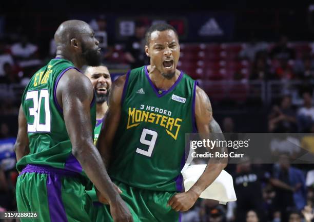 Rashard Lewis of the 3 Headed Monsters and teammate Reggie Evans celebrate against the Aliens during week two of the BIG3 three on three basketball...