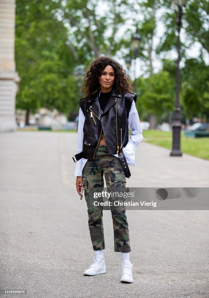 Model Cindy Bruna is seen wearing black leather vest, camouflage... News  Photo - Getty Images