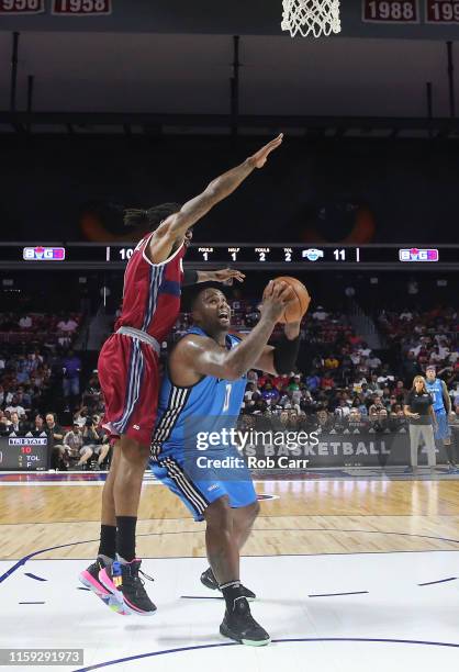 Glen Davis of the Power shoots against Amar'e Stoudemire of the Tri State during week two of the BIG3 three on three basketball league at at the...