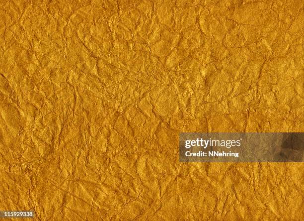 crumpled gold background - wrinkled stock pictures, royalty-free photos & images