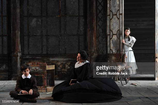 Leo Jemison as Miles, Sophie Bevan as The Governess and Elen Willmer as Flora in Garsington Opera's production of Benjamin Britten's The Turn Of The...