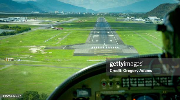 approaching the runway - cairns aerial stock pictures, royalty-free photos & images