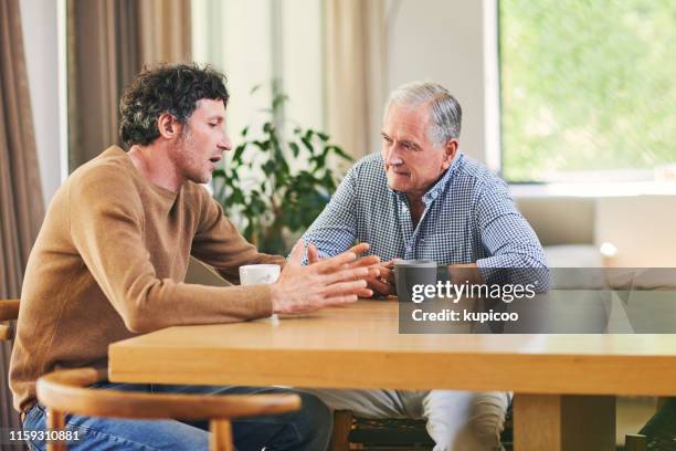 visit your parents, they love to see you - table discussion stock pictures, royalty-free photos & images