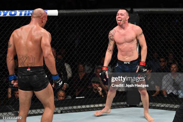 Colby Covington taunts Robbie Lawler in their welterweight bout during the UFC Fight Night event at the Prudential Center on August 3, 2019 in...