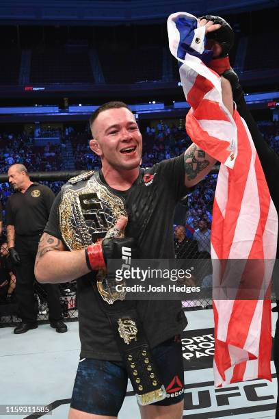 Colby Covington celebrates his victory over Robbie Lawler in their welterweight bout during the UFC Fight Night event at the Prudential Center on...