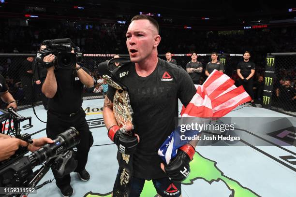 Colby Covington celebrates his victory over Robbie Lawler in their welterweight bout during the UFC Fight Night event at the Prudential Center on...