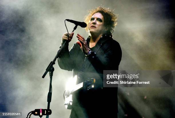 Robert Smith of The Cure performs headlining The Pyramid Stage during day five of Glastonbury Festival at Worthy Farm, Pilton on June 30, 2019 in...