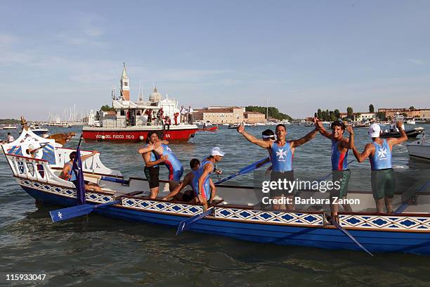 Amalfi celebrate after crossing the line during the Regatta of Ancient Maritime Republics on June 12, 2011 in Venice, Italy. The Regatta of Ancient...